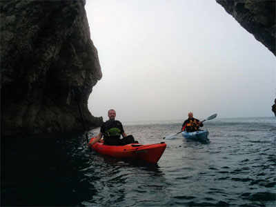 Sit on top paddling at Durdle Door on the Jurassic Coast