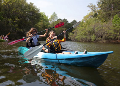 Family paddling on the Feelfree Gemini Sport sit on top kayak