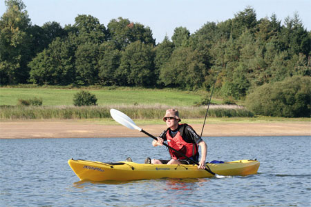 Paddling the Perception Triumph 13 on a lake